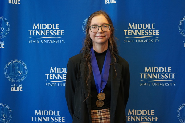 Representation of the achievement named 'Taylor Tims successfully defends Honors thesis at MTSU'.