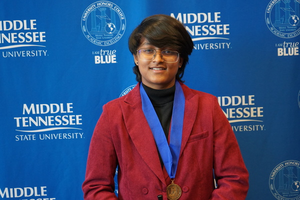 Representation of the achievement named 'Maheswari Ramesh successfully defends Honors thesis at MTSU'.