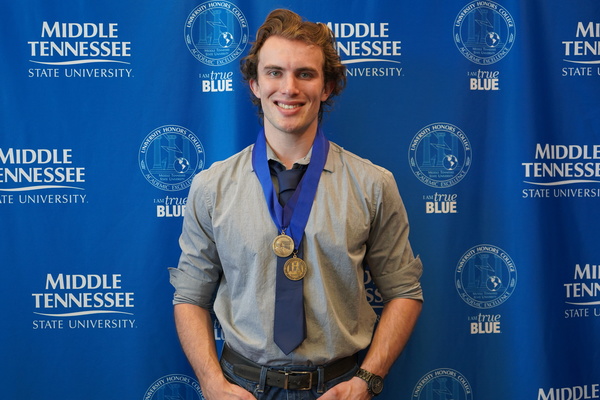 Representation of the achievement named 'Dakota Carver successfully defends Honors thesis at MTSU'.