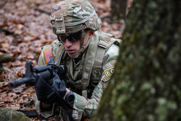 New York  Army National Guard Spc. Trevor Lock, a military police officer with 105th Military Police Company participates in a situational training exercise during the New York Army National Guard Best Warrior Competition 2026 at Camp Smith Training Site in Cortlandt Manor, N.Y., on March 23, 2026. (U.S. Army National Guard Photo by Sgt. Maximillian Boudreaux)