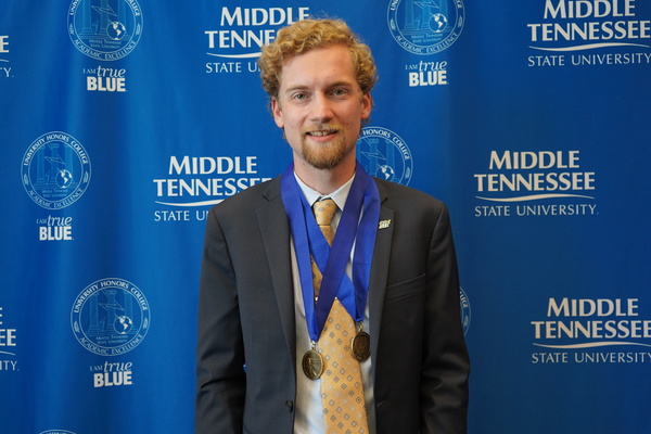 Representation of the achievement named 'Peter Hoffpauir successfully defends Honors thesis at MTSU'.