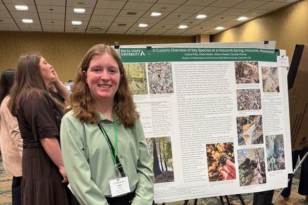 Senior Aubrie Pitts of Brandon presenting her poster on species observed at Holcomb Spring at the Mississippi Academy of Sciences Conference