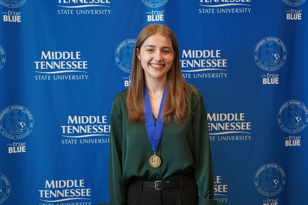 Representation of the achievement named 'Aubrey Von Dem Bussche successfully defends Honors thesis at MTSU'.