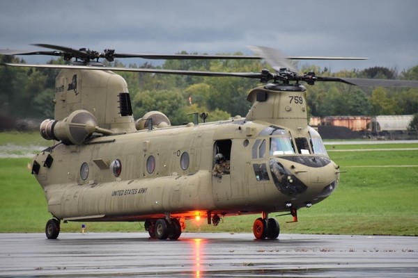 A New York Army National Guard CH-47F Chinook helicopters takes off from the Frederick Douglas Greater Rochester International Airport on Wednesday, Sept. 28, 2022 heading for Jacksonville Florida to provide support to the Florida National Guard asHurricane Ian headed or the state. Two aircraft and 11 Soldiers were deployed for the mission at the direction of Governor Kathy Hochul. ( U.S. Air National Guard photo by Lt. Jason Carr) (1st Lt. Jason Carr)