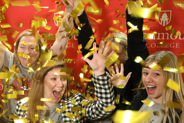 CELEBRATE! Hannah Maher (checkered jacket) has been part of all nine previous Scots Day of Giving events and is looking forward to the 10th edition, which will be held April 15.