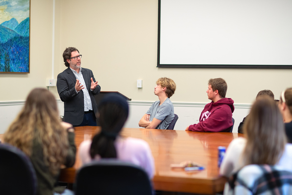 SUNY Potsdam Professor Dr. Robert Hinckley leads a lecture in one of his political science classes in Satterlee Hall. He and his colleagues have helped to develop a partnership with the New York Association of Towns to incorporate public service competencies into coursework, efforts that will be further enhanced thanks to support from the SUNY Embedding Industry Credentials into Academic Coursework (EICAC) initiative.