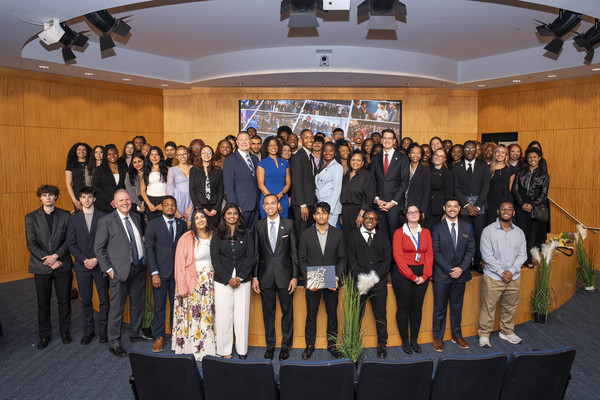 Photo of members of the Student Government Association on stage with administrators