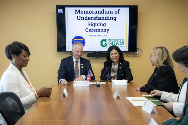 Leaders from NYIT College of Osteopathic Medicine at Arkansas State University and the University of Guam gather for a memorandum of understanding signing ceremony on April 2 at the UOG. Pictured (L to R): Dr. Brookshield Laurent, NYITCOM associate dean for public and population health; Dr. Shane Speights, dean of NYITCOM's Arkansas campus; UOG President Dr. Anita Borja Enriquez; UOG senior vice president and provost Sharleen Santos-Bamba; and Rachael Leon Guerrero, dean of the UOG College of Natural and Applied Sciences. 