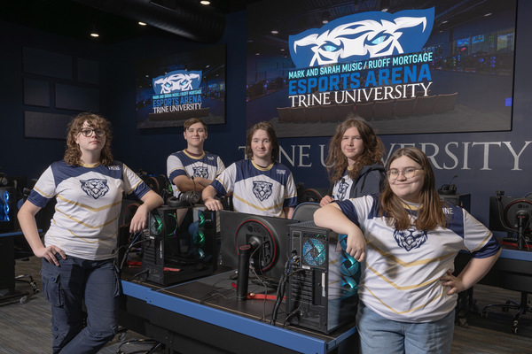 Trine University’s Overwatch Navy esports team, from left, Addie Winebrenner, Xander Bowman, Sean Smith, Aiden Keever and Kylee Garrity, was undefeated during the Block House Esports League MIAA regular season and playoffs. (Photo by Dean Orewiler / Trine University)