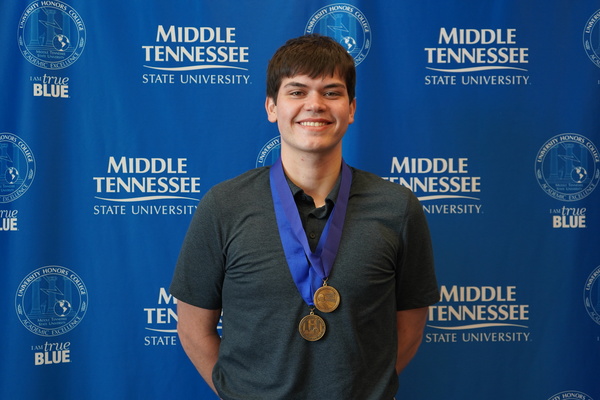 Representation of the achievement named 'Drew Hair successfully defends Honors thesis at MTSU'.
