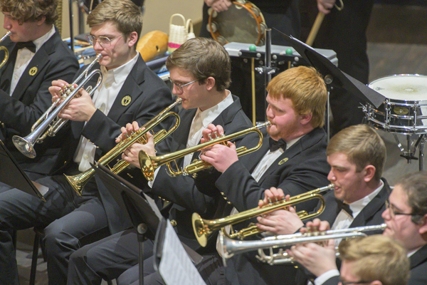 Students playing trumpets