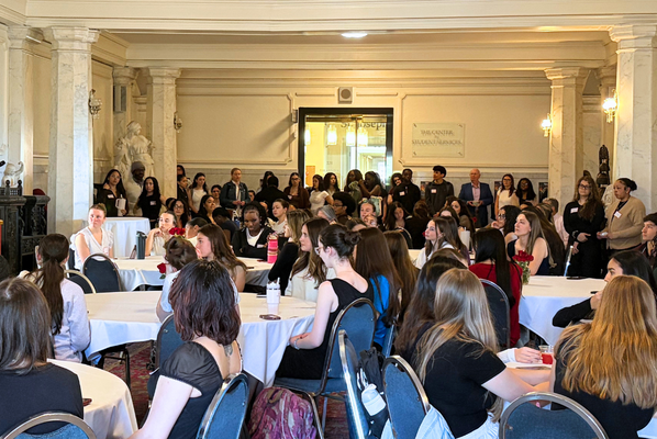 Students gathered in the College Hall Foyer for the opening ceremony of the Symposium.