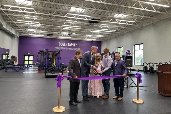 From L to R: Director of Athletics Dr. Kenneth “Ziggy” Siegfried, UE Trustee Curt Begle '99, Kelley Begle '00, Crue Begle, and UE President Christopher M. Pietruszkiewicz.