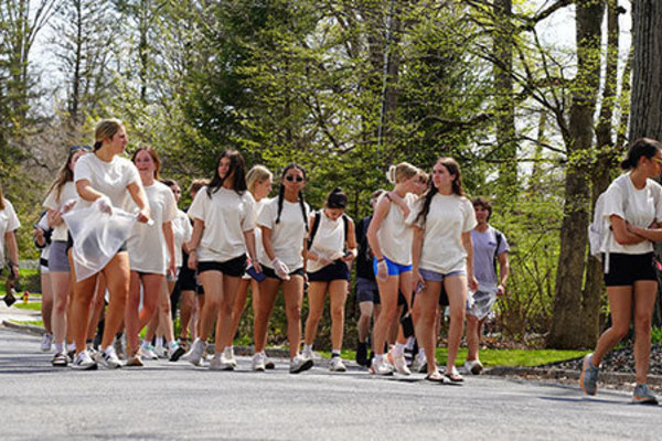 Representation of the achievement named 'Community Cleanup Held by ESU Greek Organizations'.