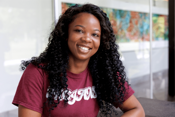 Representation of the achievement named 'Balancing Motherhood and Medicine: Kadeshia Cooper Reaches Nursing Milestone'.