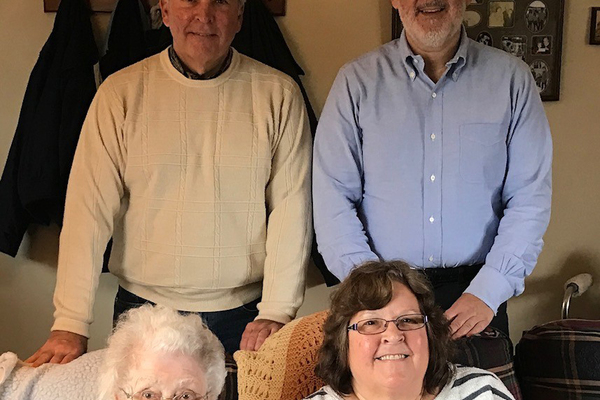 THE WHEELER FAMILY: Ron Wheeler is pictured in the upper right. Continuing clockwise are his sister, Barb Wheeler Byrne '77, his late mother, Phyllis Holmquist Wheeler '49, and his brother, Paul Wheeler.