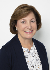 Eileen Goss Whelley poses for a portrait.