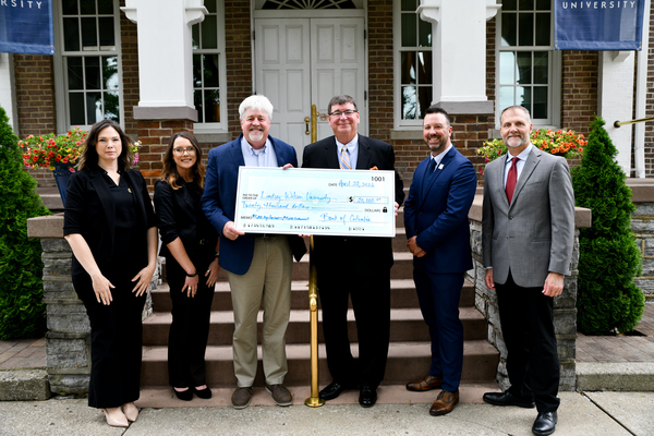 The Bank of Columbia presents $20,000 to Lindsey Wilson University. The gift will be used to support the Tommy D. Grider Endowed Scholarship and the university’s new agribusiness program. From left: Bank of Columbia Chief Credit Officer Michelle Powell, Bank of Columbia Chief Financial Officer Ashley Roy, Bank of Columbia President and CEO Mark Dykes, Lindsey Wilson President William T. Luckey Jr., Lindsey Wilson Dean of the School of Business and Communication Benson Sexton '04 and Lindsey Wilson Vice President for Academic Affairs Ray Lutgring.