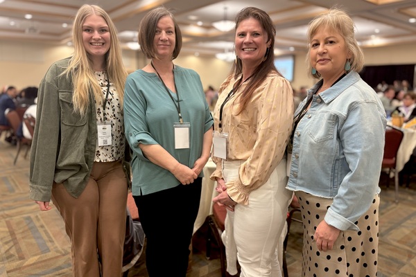 From left to right, Shelby Alguire, Dr. Kelly Bonnar, Jennifer Dalton and Theresa Adams pose for a photo while attending the New York State Public Health Partnership Conference in Lake Placid, N.Y.