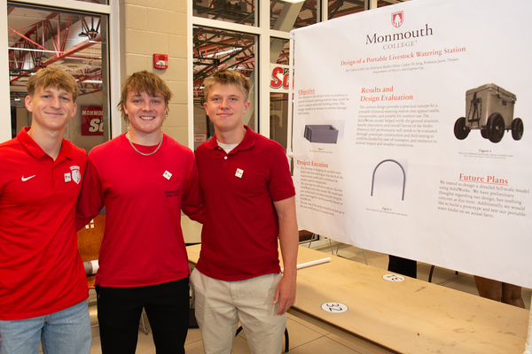 REAL-WORLD RESEARCH: From left, Cohen Ledet, Kaden Olsen and Cadan De Jong showed off their project, which is titled "Development of a Portable Livestock Watering Station for Pasture and Pen Use." Not pictured is the fourth member of their team, Ian Rowland.