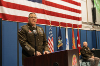 Brig. Gen. Jason Lefton speaking from the podium during his promotion ceremony.