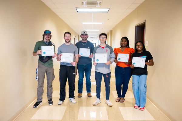 Representation of the achievement named 'Mu Alpha Theta Inducts 8 New Students in Spring 2026'.