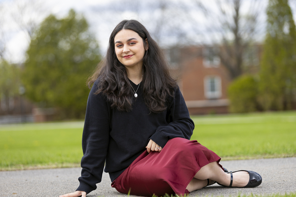 Alyssa Spina poses for a photo in the Academic Quad at SUNY Potsdam.