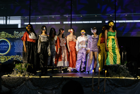 SUNY Oneonta students modeling other students' design work at the annual Student Fashion Show.