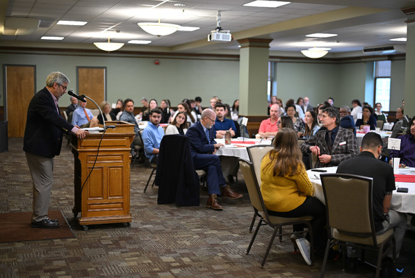 SUNY Oneonta President Dr. Alberto Cardelle delivers an address to students and faculty at the Academic Achievement Awards.