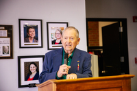John Brooks '67 speaks at the naming of the Brooks Family Welcome Center in Alumni Hall at SUNY Delhi. 