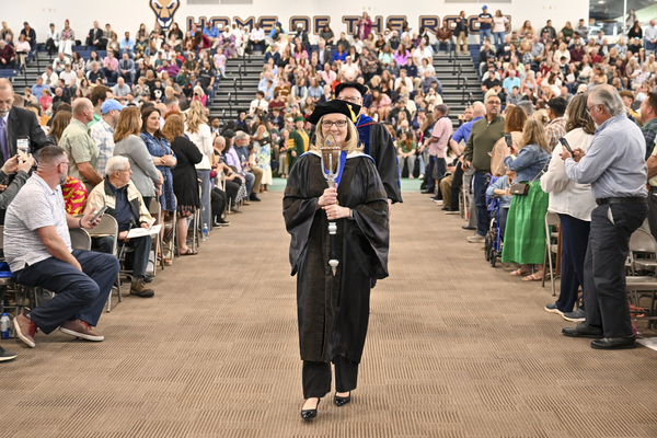 Professor and Physical Therapist Assistant Program Director Deborah Molnar served as the mace bearer for SUNY Canton's 118th Commencement Ceremony and led the procession of academics and graduates Saturday, May 9. 