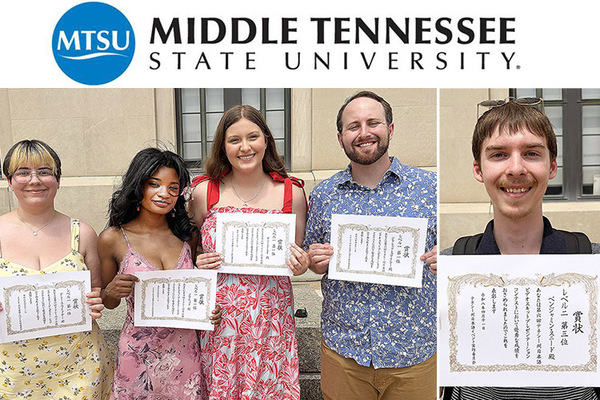 Five students hold certificates.