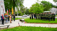 Firefighters join veterans for a wreath laying at the Rainbow Division Memorial in Garden City, New York.