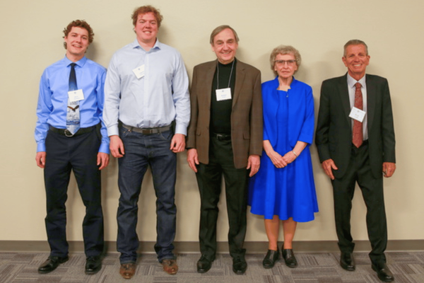 (Left to right) Adam '19 and Collin Christiansen '16 (accepting on behalf of their grandfather, Dr. Alex B. Russell Jr.), Dr. Richard Fischer, Marcille Brehmer and David Burgdorf