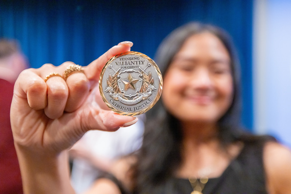 Representation of the achievement named 'Criminal Justice Students Receive Allen Jacobs Memorial Award'.