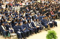 Aerial view of graduates listening to the commencement services.