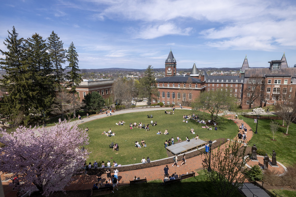 Students enjoy warm spring weather on campus at the College of the Holy Cross on April 15, 2026.
(Photo by Michael Ivins/Holy Cross)