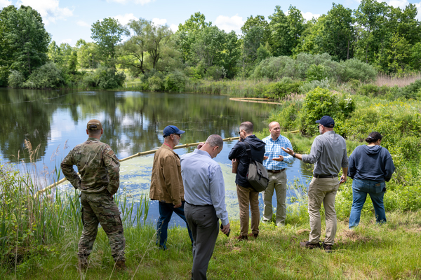 Members of the Stewart Air National Guard Base Restoration Advisory Board, designed to provide a forum for effective two-way communication between the community and the New York Air National Guard about the environmental work that is being conducted at Stewart Air Guard Base, tours the water decontamination project site and its state-of-the-art equipment on May 30, 2024. (U.S. Air National Guard photo by Master Sgt. Daniel Hotter)    