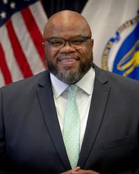Head shot of morning graduation speaker Dr. Patrick Tutwiler.