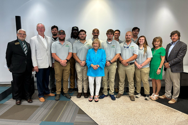 Pilots from the DSU Agricultural Aviation Operations Career Pathway received their certifications Thursday, joined by officials from Delta State, the South Delta Planning and Development District, DRAFT, LLC, and Senator Cindy Hyde-Smith's office. (L to R, front to back) Mitzi Woods, Dr. Joe Childs, Bill Crump, Garrett Stanfield, Austin Ard, Jeffery Croom, Levi Gee, Morgan Cotton, Sheila Millican, Ike Brunetti, Michael Derr, Ja'Den Williams, August Ganchiff, Kolby Nelson, Christian Wagner.