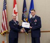 NYANG Col.  Roos receives his retirement award on May 12, 2026.
