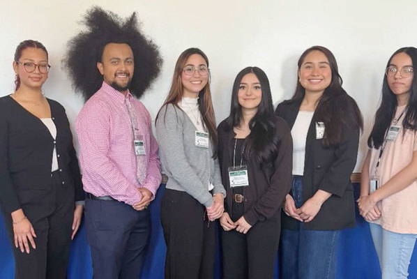 Representation of the achievement named 'UNG students present research, help host conference'.