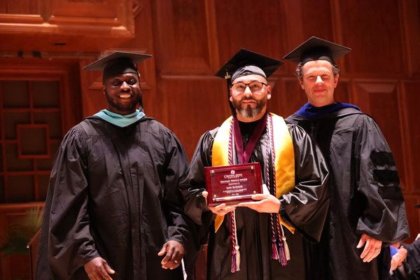 Representation of the achievement named 'Luis Rosado Received Military Service Award at 2026 Central Penn College Commencement Ceremony'.