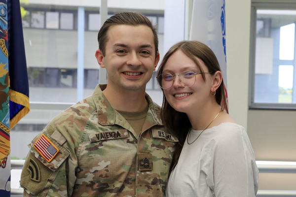 Sgt. 1st Class Andrew Valenza, a Schroon Lake resident, and his wife Lexi Dezalia pose for a photograph following his promotion on May 20, 2026. (U.S. Army National Guard photo by Stephanie Butler)    