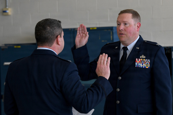 New York Air National Guard Col. Jeffrey D. Cannet, left, administers the colonel's oath to Col. Jesse J. Fritz, right, during Fritz's promotion ceremony on May 8, 2026 at Francis S. Gabreski Air National Guard Base, Westhampton Beach, New York. Fritz was promoted to colonel and serves as the 106th Rescue Wing Maintenance Group Commander. (U.S. Air National Guard photo by Tech. Sgt. Kevin Donaldson)