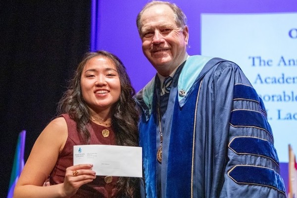 Representation of the achievement named 'Olive Anderson Honored by Hartwick College'.