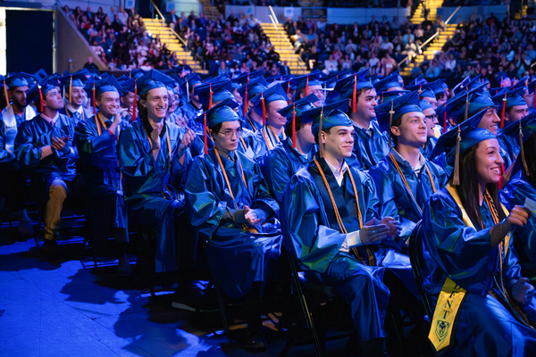 Students are seated in gaps and gowns during Western New England University's 2026 Commencement Ceremony held May 14, 2026 at MassMutual Center.