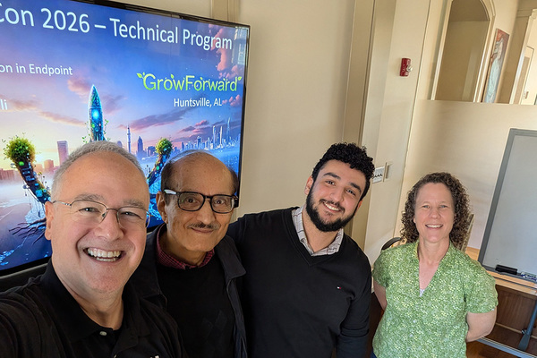 Representation of the achievement named 'UNG alum presents cyber research at conference'.