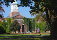Students walk across SUNY Potsdam's Academic Quad in the summer.