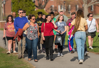 Prospective students and parents tour SUNY Potsdam in the summertime.